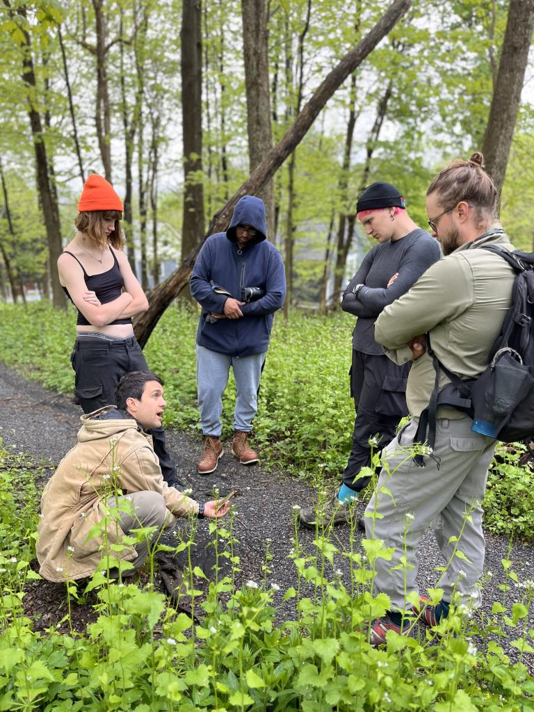 Greenagers began their May workday on the Lake Mansfield Trail with a discussion of trail repair strategies.