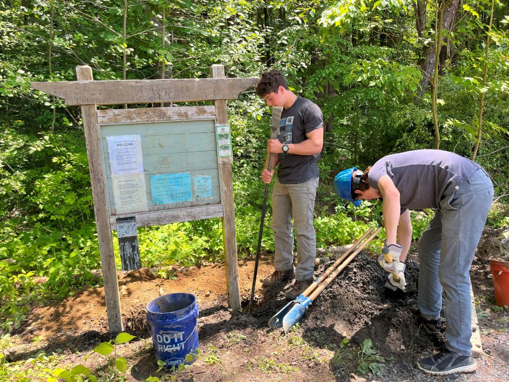 Despite a lot of hidden rocks, the forest trailhead kiosk was installed and will soon be spruced up.