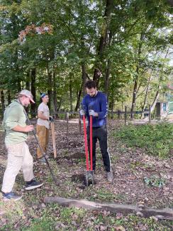 Greenagers Crew Members installed repurposed rails to be used as the posts for the upcoming fence on September 29, 2025